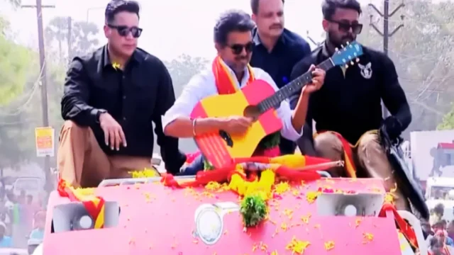 Guitar In Hand, Boy On Shoulders: Glimpses From Vijay's Tirunelveli Guitar In Hand, Boy On Shoulders: Glimpses From Vijay's Tirunelveli Roadshow | PHOTOS