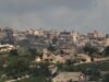 Israel says troops fighting Hezbollah surrounded key Lebanon town Israel says troops fighting Hezbollah surrounded key Lebanon town