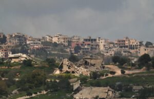 Israel says troops fighting Hezbollah surrounded key Lebanon town Israel says troops fighting Hezbollah surrounded key Lebanon town