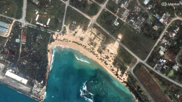 Searchers find body of 1 of 6 missing crew members from ship that overturned during typhoon