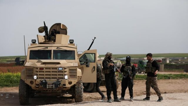 Syria says takes over northeast base after international coalition pullout