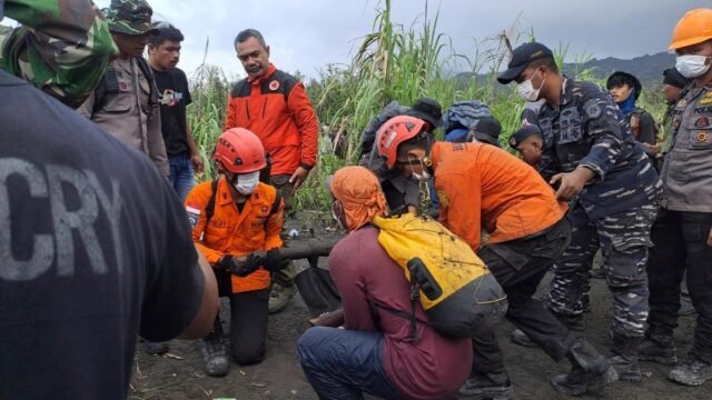 Indonesian rescuers find 1 body after volcano eruption as search continues for 2 more